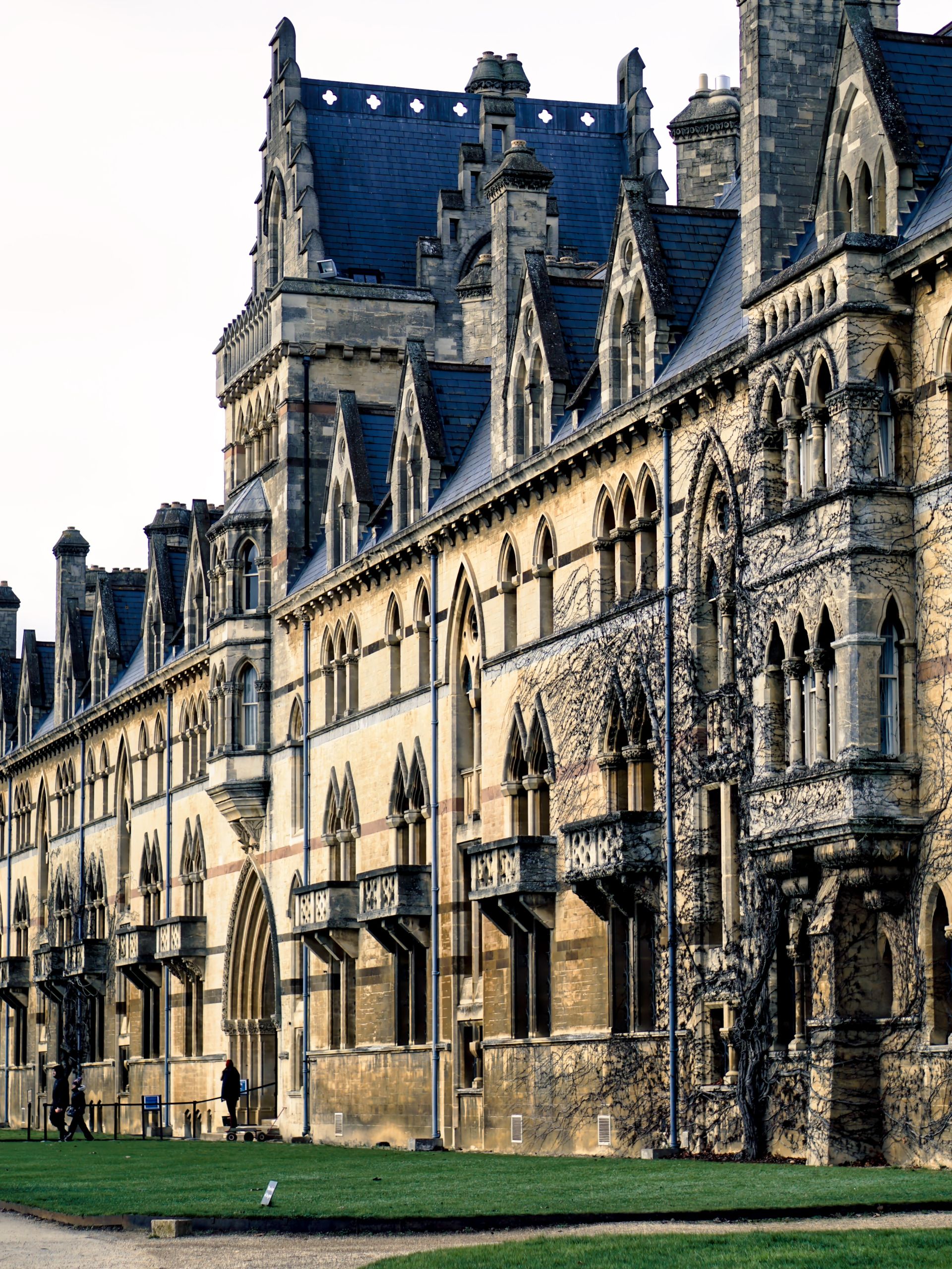 View of historic Gothic architecture in Oxford, England featuring ornate stone facades.